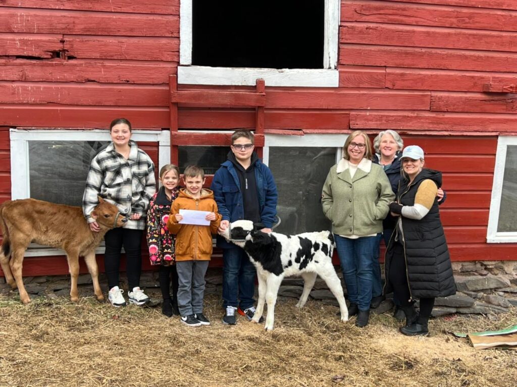 children with farm animals